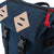 Detail shot of navy klettersack showing flap top with side-release buckle closures