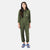 Front model shot of the Topo Designs Women's Coverall jumpsuit in Olive green