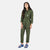 Front model shot of the Topo Designs Women's Coverall jumpsuit in Olive green