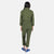 Back model shot of the Topo Designs Women's Coverall jumpsuit in Olive green