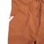 General detail shot of the Topo Designs Women's Coverall in Brick showing front hand pockets.