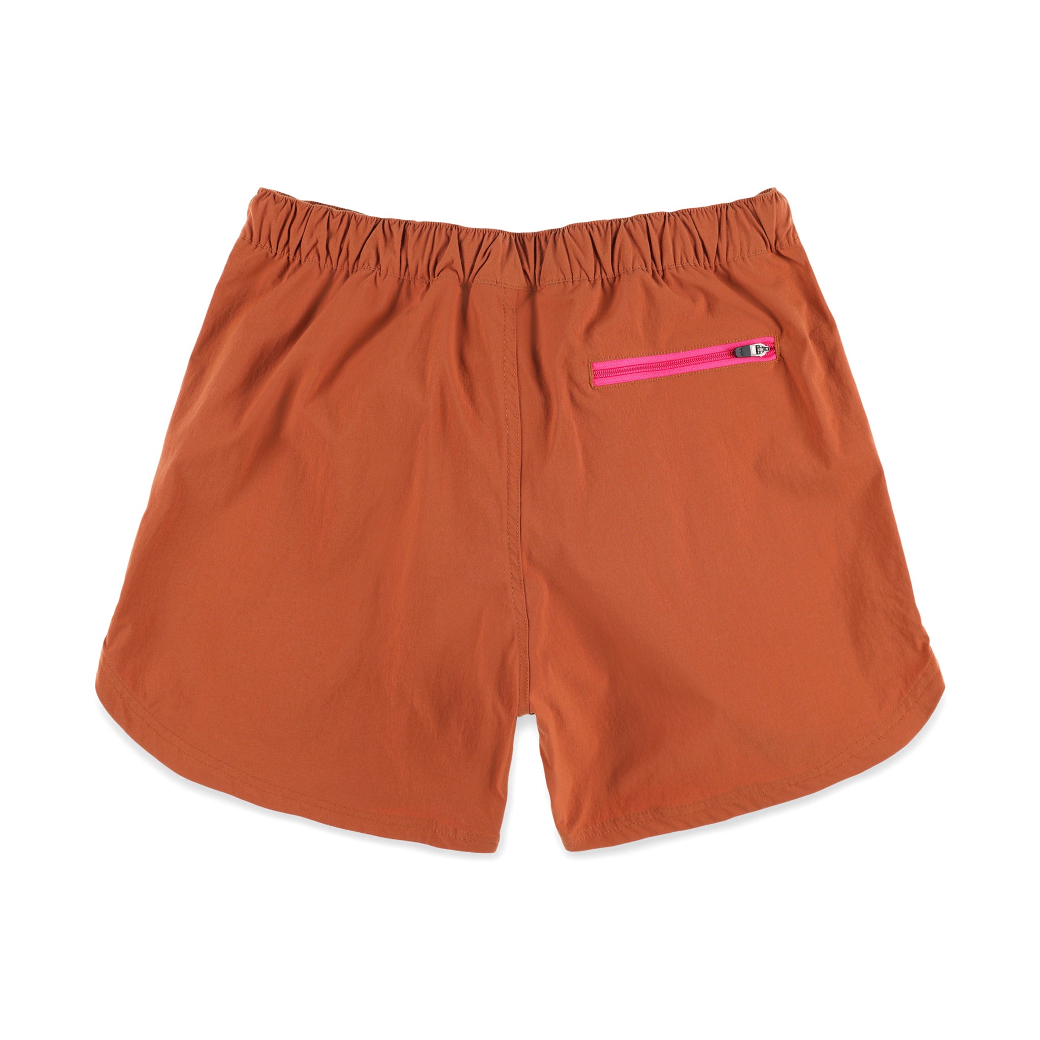 Reißverschlusstasche auf der Rückseite der Topo Designs Damen River quick-dry swim Shorts in "Brick" orange.