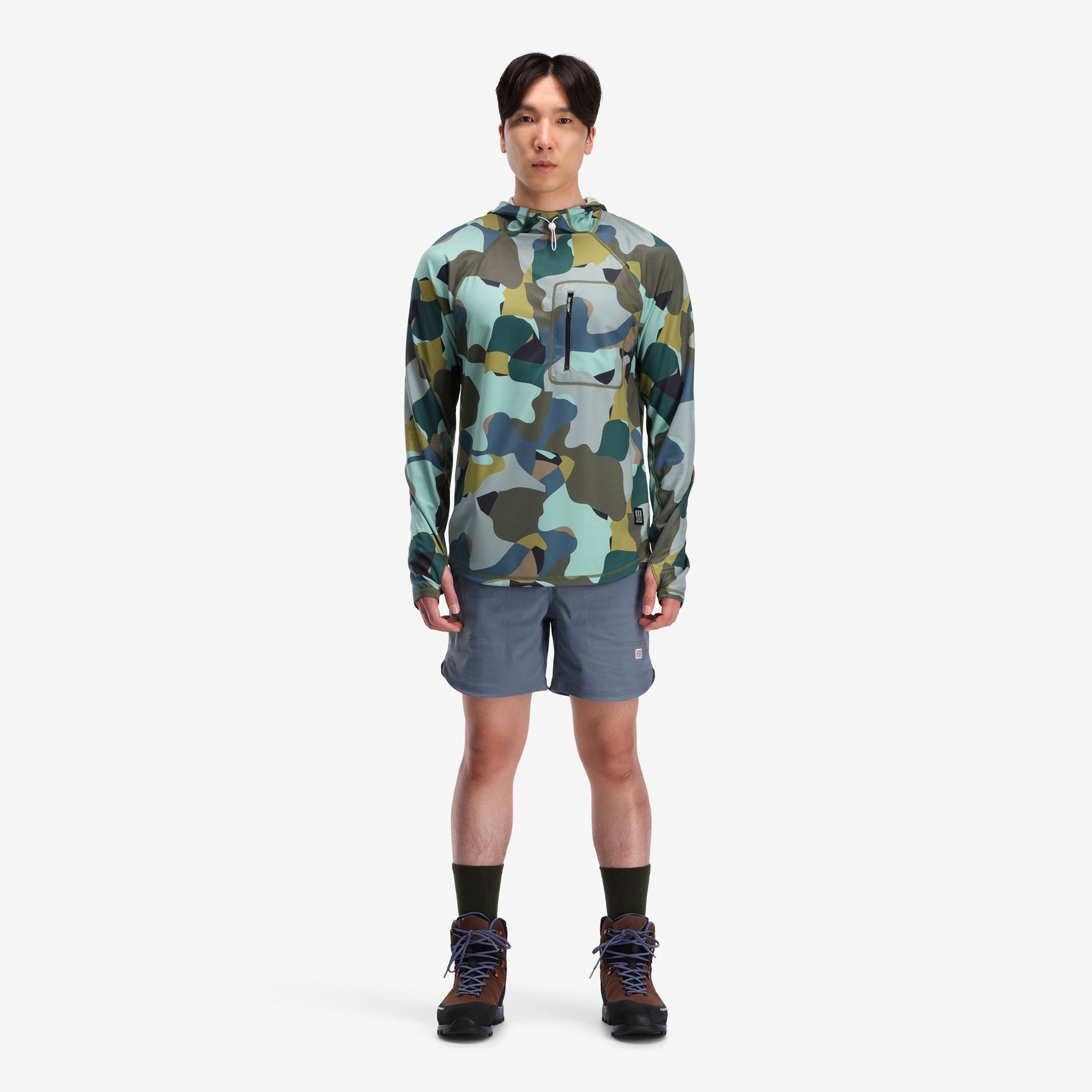 General on model front shot of Topo Designs Herren River Hoodie 30+ UPF moisture wicking quick dry top in "Green Camo" grün.