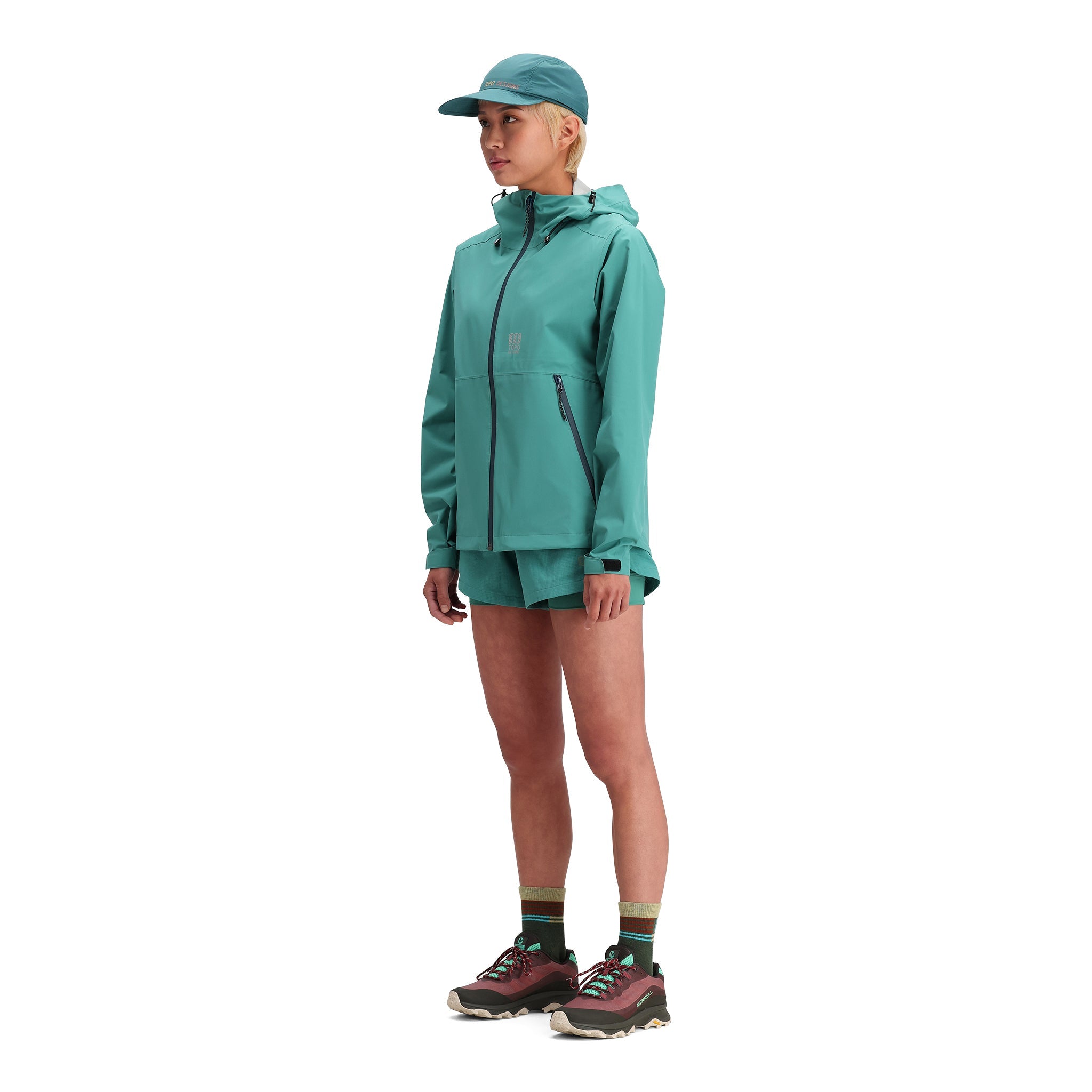 Allgemeine Seitenaufnahme des Modells Topo Designs Global Trek Shorts - Damen in "Caribbean"