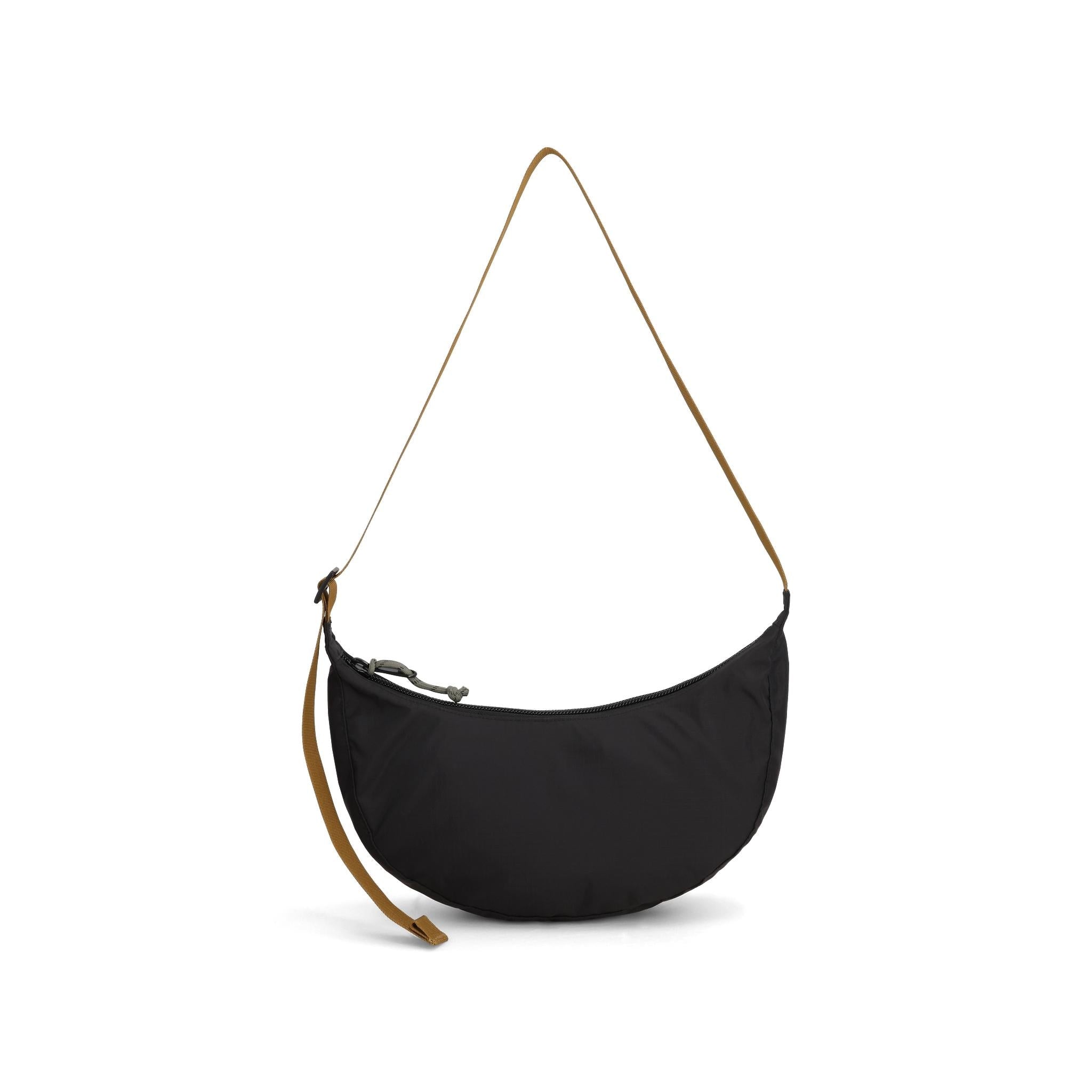 Rückansicht der Topo Designs Moonlight Crossbody Bag in "Schwarz / Neutral"