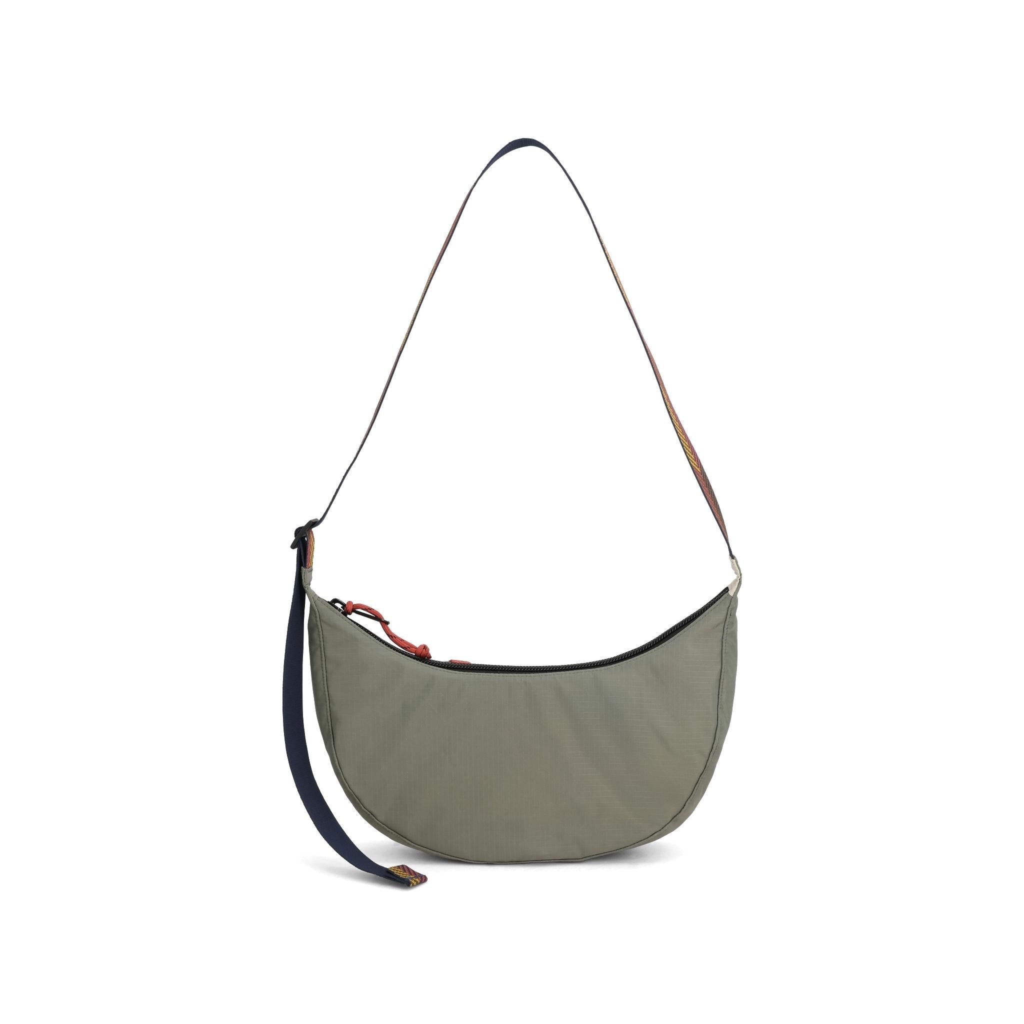 Rückansicht der Topo Designs Moonlight Crossbody Bag in "Bone White / Beetle"